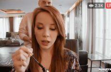 girl putting on makeup gives surprise blowjob